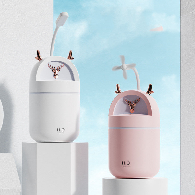 Yilu Has You Cute Pet Deer Mini Humidifier Usb in white and pink, enhancing home decor while providing humidity.