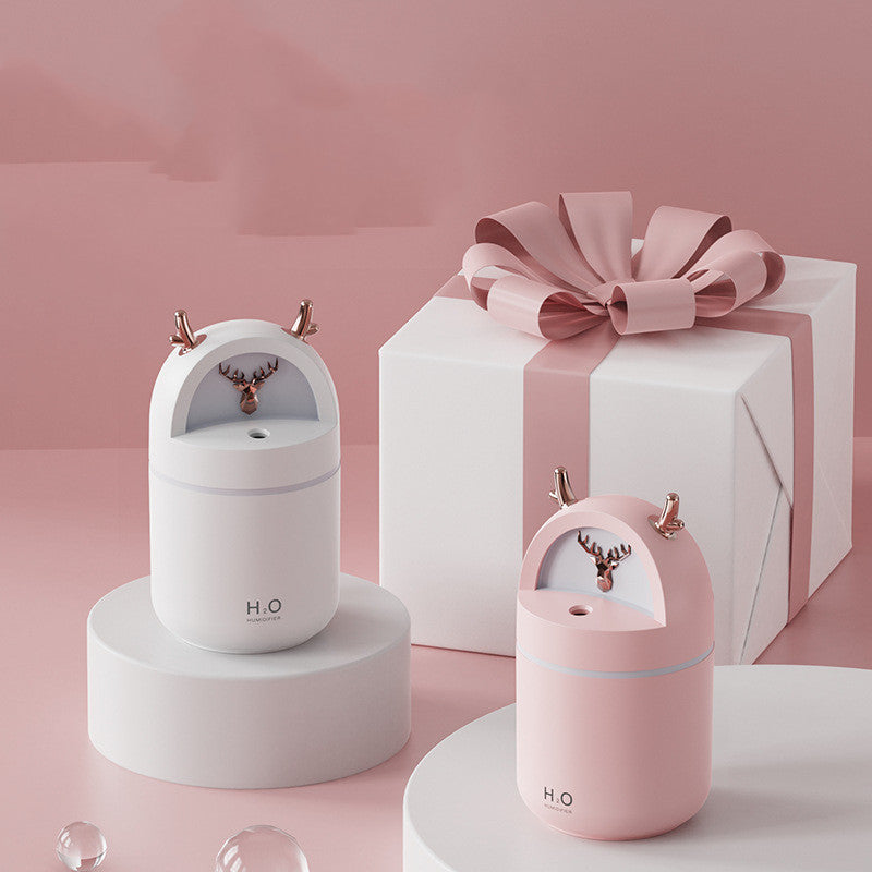 Yilu Has You Cute Pet Deer Mini Humidifier Usb in white and pink color, stylishly displayed with gift box.